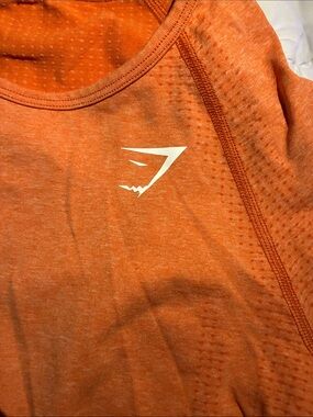 Gymshark Kids Orange Performance Tee with White Logo